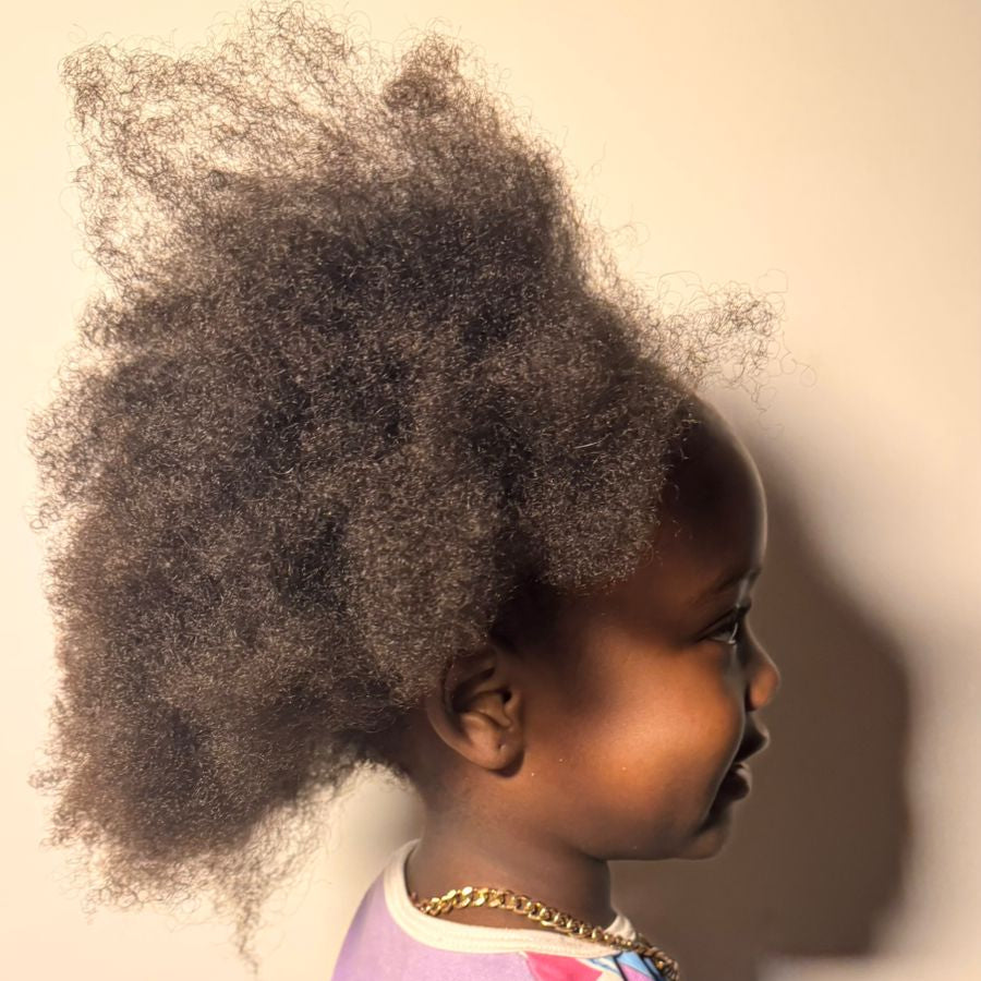 Child with textured natural hair – DÉLSER wash day routine for curly and afro hair